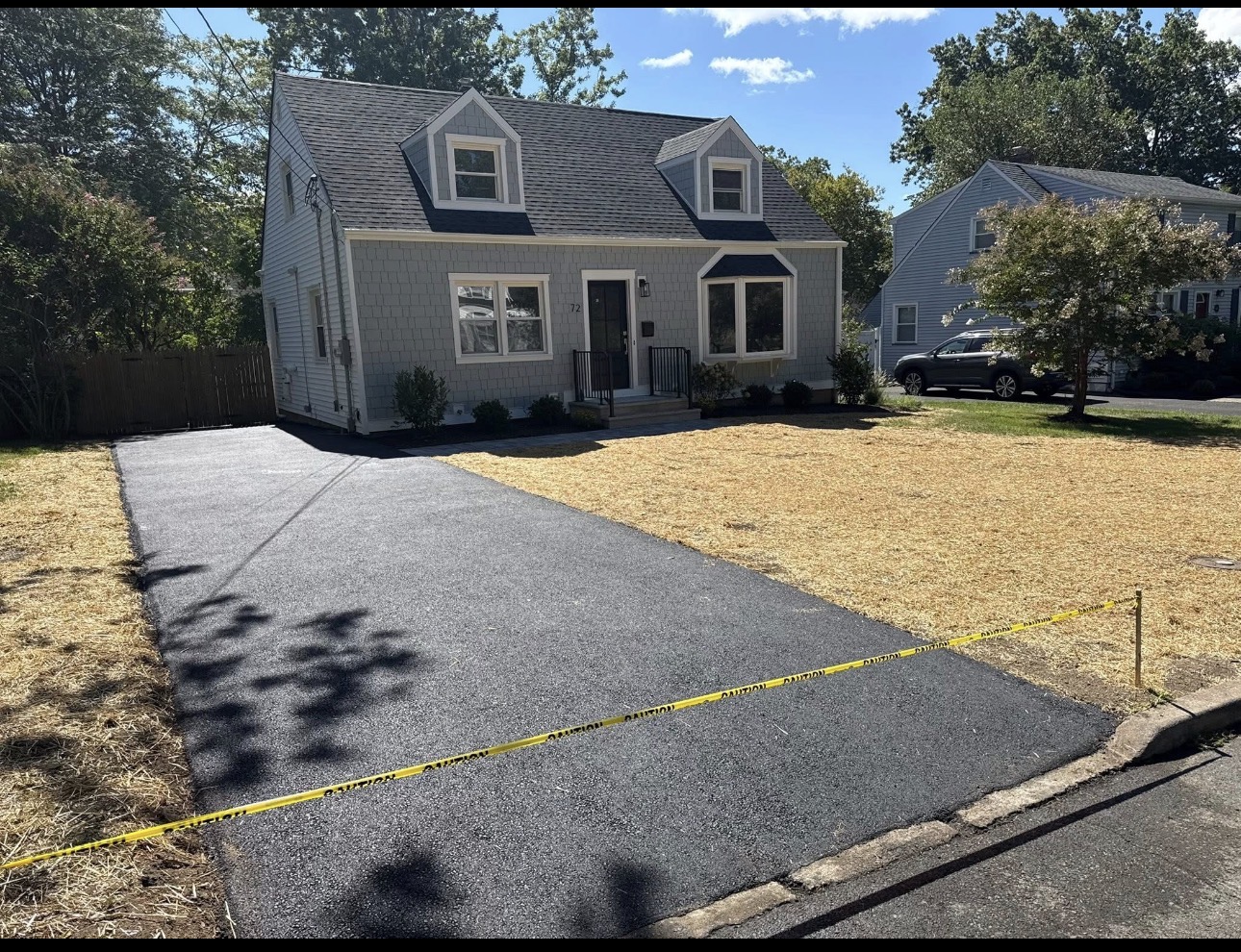 Newly paved asphalt driveway at a Cape Cod home in New Jersey
